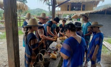 Thailand Elephant Sanctuary - Volunteers having a meal